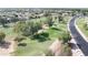 Aerial view of neighborhood with golf course and homes at 968 S Western Skies Dr, Gilbert, AZ 85296