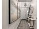 Grand entryway with stylish decor, a statement mirror, and elegant light fixture at 10029 E Tahoe Ave, Mesa, AZ 85212