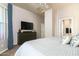 Comfortable bedroom with ensuite bathroom access at 10196 E Legend Trl, Gold Canyon, AZ 85118