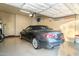 Attached garage with built-in storage cabinets at 10196 E Legend Trl, Gold Canyon, AZ 85118