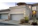 Two-car garage with additional parking and mountain views at 10196 E Legend Trl, Gold Canyon, AZ 85118