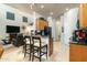 Kitchen features breakfast bar and black appliances at 10196 E Legend Trl, Gold Canyon, AZ 85118