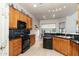 Well-equipped kitchen with ample cabinetry and island at 10196 E Legend Trl, Gold Canyon, AZ 85118