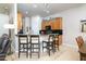 Modern kitchen with dark countertops and breakfast bar at 10196 E Legend Trl, Gold Canyon, AZ 85118
