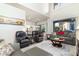 Open living room with comfortable seating and large windows at 10196 E Legend Trl, Gold Canyon, AZ 85118