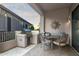 Outdoor patio with seating area and built-in grill at 10196 E Legend Trl, Gold Canyon, AZ 85118