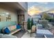 Cozy patio with seating area and mountain views at 10196 E Legend Trl, Gold Canyon, AZ 85118