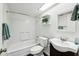 Clean bathroom with a bathtub, toilet, and vanity at 10572 W Echo Ln, Peoria, AZ 85345