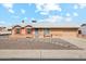 Ranch-style home with a landscaped yard and attached garage at 10572 W Echo Ln, Peoria, AZ 85345