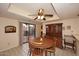 Charming dining area with wood table and hutch at 11074 E Yucca St, Scottsdale, AZ 85259