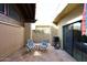 Private patio with seating and a grill at 11074 E Yucca St, Scottsdale, AZ 85259