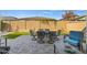 Enjoy this backyard patio with comfortable seating and a view of the grass at 11444 N Northfield St, Surprise, AZ 85388