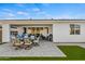 Wonderful backyard with covered patio, artificial grass, and a built-in grill at 11444 N Northfield St, Surprise, AZ 85388