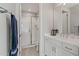 Modern bathroom with a walk-in shower and white vanity at 11444 N Northfield St, Surprise, AZ 85388