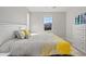 Guest bedroom with king-size bed and a dresser at 11444 N Northfield St, Surprise, AZ 85388