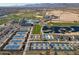 Aerial view of community amenities including tennis courts, pools, and clubhouse at 11444 N Northfield St, Surprise, AZ 85388