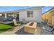 Cozy fire pit area perfect for relaxing evenings in the backyard at 11444 N Northfield St, Surprise, AZ 85388