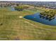 Golf course with a lake and residential area at 11444 N Northfield St, Surprise, AZ 85388