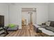 Spacious living room with gray sofas, striped armchairs, and a large window at 11444 N Northfield St, Surprise, AZ 85388