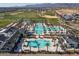 Resort-style pool and spa with palm trees and mountain views at 11444 N Northfield St, Surprise, AZ 85388