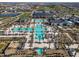 Resort-style pool with palm trees and lounge chairs at 11444 N Northfield St, Surprise, AZ 85388