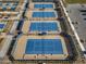 Three well-maintained tennis courts with surrounding fencing at 11444 N Northfield St, Surprise, AZ 85388