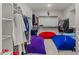 Large walk-in closet with ample shelving and hanging space at 11444 N Northfield St, Surprise, AZ 85388