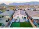 Aerial view of home showcasing backyard oasis with putting green at 12493 E Pivot Peak --, Gold Canyon, AZ 85118