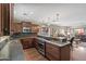 This kitchen features wood cabinets, a breakfast bar, granite countertops and stainless steel appliances at 1449 E Mulberry St, Phoenix, AZ 85014