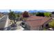 Aerial view of a house with a red tile roof and surrounding landscape at 14644 N 7Th Pl, Phoenix, AZ 85022