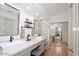 Modern bathroom with updated fixtures and double vanity at 14644 N 7Th Pl, Phoenix, AZ 85022