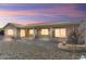 Covered back patio with ample space for outdoor seating and entertaining at 15406 W Pinchot Ct, Goodyear, AZ 85395