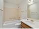 Bathroom featuring a bathtub, toilet, and vanity with a wood cabinet base at 15406 W Pinchot Ct, Goodyear, AZ 85395