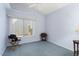 Bright bedroom with blue carpet, neutral walls, and comfortable decor at 15406 W Pinchot Ct, Goodyear, AZ 85395