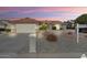 Lovely home featuring a two-car garage, tidy landscaping, and a 'Coming Soon' sign at 15406 W Pinchot Ct, Goodyear, AZ 85395