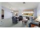Open-concept living room with plenty of natural light and stylish furnishings at 15406 W Pinchot Ct, Goodyear, AZ 85395
