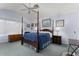 Spacious main bedroom with ceiling fan, bright light, and charming decor at 15406 W Pinchot Ct, Goodyear, AZ 85395