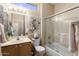 Clean bathroom with a tub, shower, and updated vanity at 16203 W Starry Sky Dr, Surprise, AZ 85374