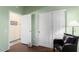 Bright bedroom with double doors leading to a spacious closet at 16203 W Starry Sky Dr, Surprise, AZ 85374