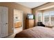 Bedroom with en-suite bathroom and walk-in closet at 16203 W Starry Sky Dr, Surprise, AZ 85374