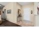 Bright entryway with tile flooring and a console table at 16203 W Starry Sky Dr, Surprise, AZ 85374