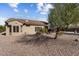 Single-story home with a brown exterior and desert landscaping at 16203 W Starry Sky Dr, Surprise, AZ 85374