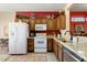 Spacious kitchen with granite countertops and wood cabinets at 16203 W Starry Sky Dr, Surprise, AZ 85374