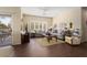 Living room featuring comfortable seating and wood-look floors at 16203 W Starry Sky Dr, Surprise, AZ 85374