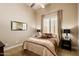 Cozy bedroom with a double bed and nightstand at 1653 W Zion Pl, Chandler, AZ 85248