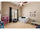 bedroom with twin bed, beanbag chair, and toys at 1653 W Zion Pl, Chandler, AZ 85248