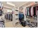 Walk-in closet with ample hanging space and shelving at 1653 W Zion Pl, Chandler, AZ 85248