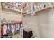 Well-organized closet with shelves and hanging clothes at 1653 W Zion Pl, Chandler, AZ 85248