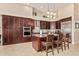 Gourmet kitchen with island and stainless steel appliances at 1653 W Zion Pl, Chandler, AZ 85248