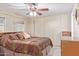 Bright bedroom with a comfortable bed and ample closet space at 205 S Higley Rd # 189, Mesa, AZ 85206